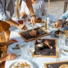 a group around a table with drinks